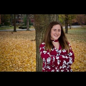 Long sleeve floral maroon blouse.